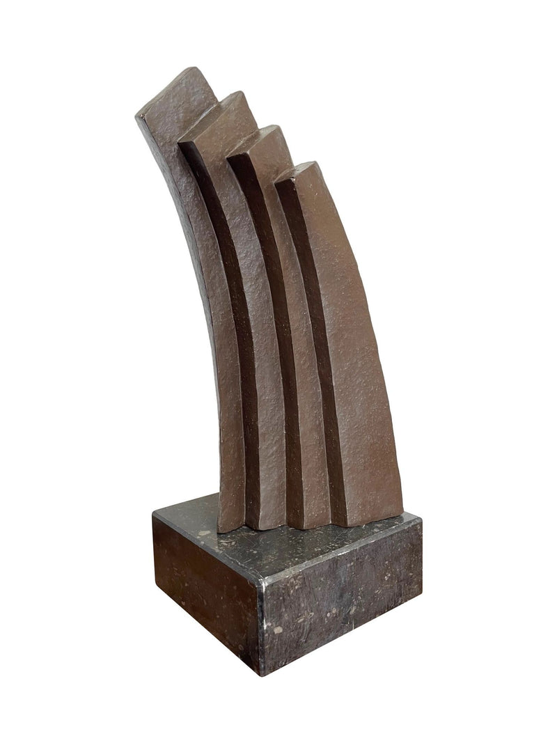 A Mid Century Belgian ceramic abstract sculpture with bronze textured style finish mounted on black marble base