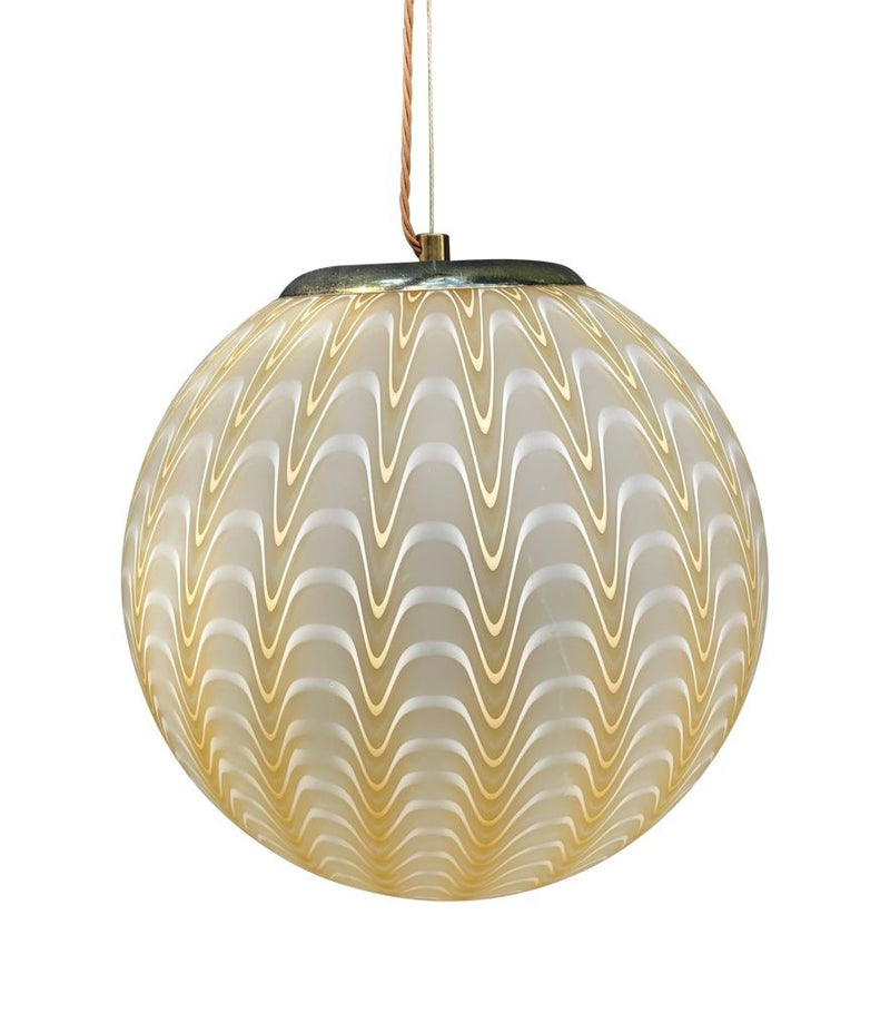 A 1960s Murano glass pendant light attributed to Venini with yellow and white swirl patten