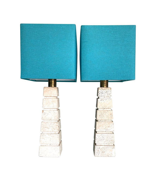 Mid Century table lamps with Travertine bases and brass fittings with blue linen shades