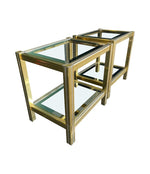 A pair of French 1970s gilt metal side tables by Pierre Vandel with original part mirrored glass shelves