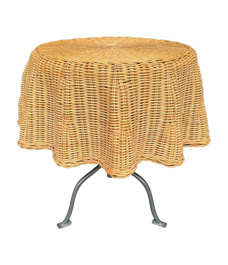 An Italian 1970s woven rattan "draped" side table with cost iron legs