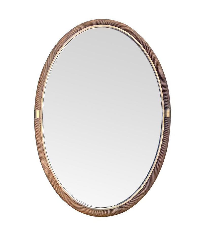 A large oval Italian 1970s twisted rattan and brass mirror in the style of Gabriella Crespi