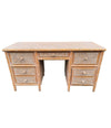 A 1980s colonial style carved wood and rattan desk by Roche Bobois