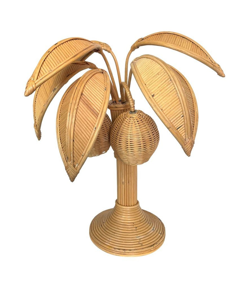 A bamboo palm tree table lamp in the style of Mario Lopez Torres with two lights