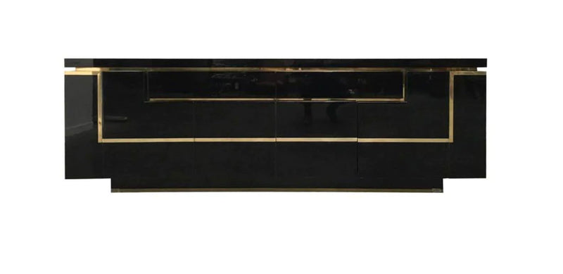 A 1970s vintage black piano lacquer sideboard by Jean Claude Mahey for Roche Bobois with brass detail