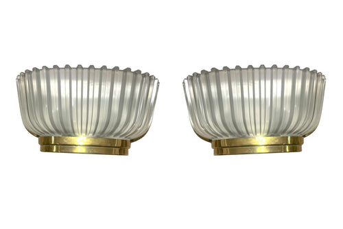 A lovely pair of 1940s Art Deco opaque Murano glass ribbed wall sconces by Seguso with brass wall mounts