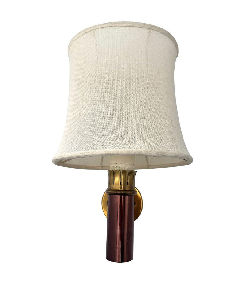 A rare pair of original 1960s copper and brass wall sconces by Stilnovo, with original labels