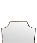 An orignal Italian 1960s brass shield mirror with beaded inner frame detail