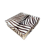 cowhide covered ottoman or coffee table with printed zebra skin design - Ed Butcher Antiques Shop London