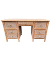 A 1980s colonial style carved wood and rattan desk by Roche Bobois