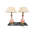 A large pair of Paul Hanson 1950s lamps with pink Murano opaline glass bases, mounted on sold brass bases