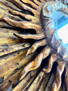 A large 1940s French carved wood gilt sunburst mirror