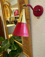 A pair of Holm Sorensen 1950s red enamelled metal and brass adjustable wall lights