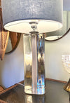 A pair of 1960s Orrefors heavy glass lamps with white glass core and nickel fittings