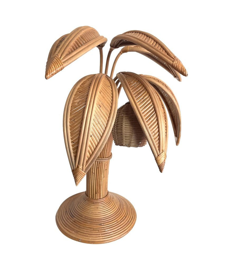 A bamboo palm tree table lamp in the style of Mario Lopez Torres with two lights