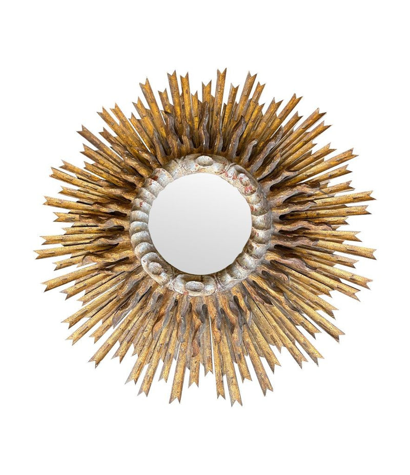 A large 1940s French carved wood gilt sunburst mirror