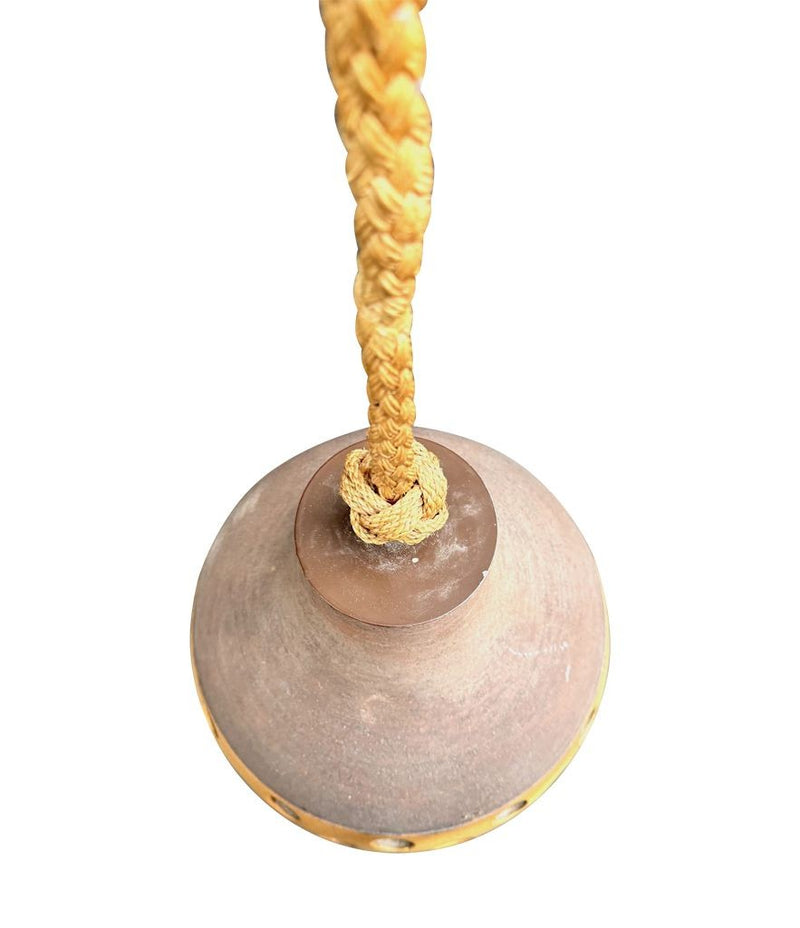 A set of three 1960s French glazed ceramic ceiling lights suspended from thick knotted rope