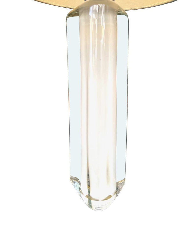 A pair of 1960s Orrefors heavy glass lamps with white glass core and nickel fittings