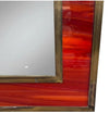 An Italian 1970s Faux tortoiseshell and brass landscape or portrait mirror