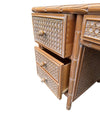A 1980s colonial style carved wood and rattan desk by Roche Bobois