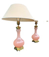 A large pair of Paul Hanson 1950s lamps with pink Murano opaline glass bases, mounted on sold brass bases