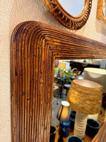 A large landscape or portrait 1970s bamboo mirror