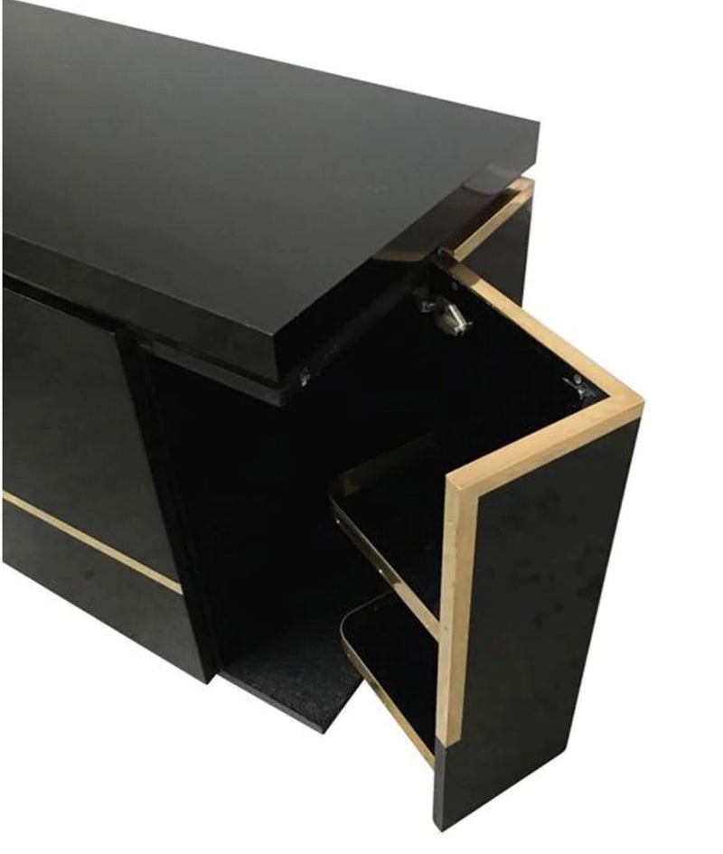 A 1970s vintage black piano lacquer sideboard by Jean Claude Mahey for Roche Bobois with brass detail