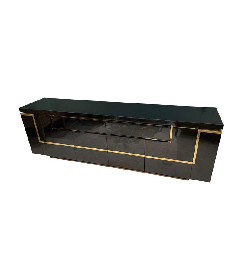 A 1970s vintage black piano lacquer sideboard by Jean Claude Mahey for Roche Bobois with brass detail