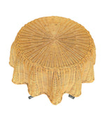 An Italian 1970s woven rattan "draped" side table with cost iron legs