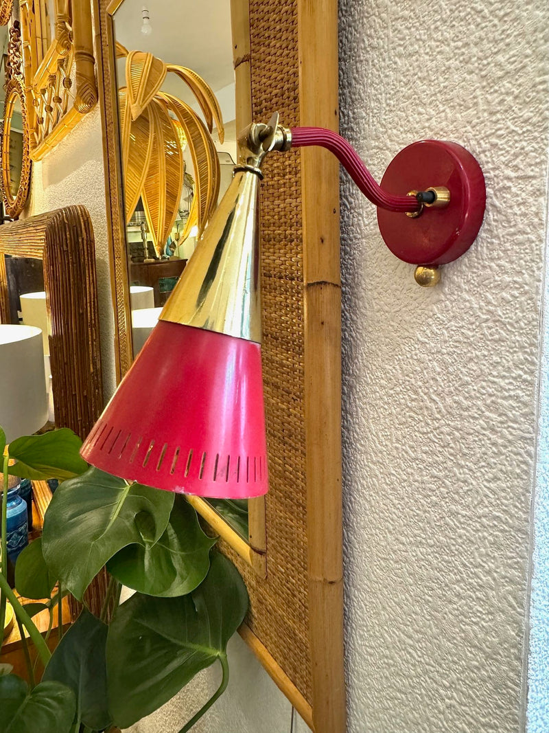 A pair of Holm Sorensen 1950s red enamelled metal and brass adjustable wall lights