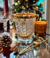 A 1960s Val Saint Lambert crystal and gold plated ice bucket with ice grabbers