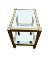 A pair of French 1970s gilt metal side tables by Pierre Vandel with original part mirrored glass shelves