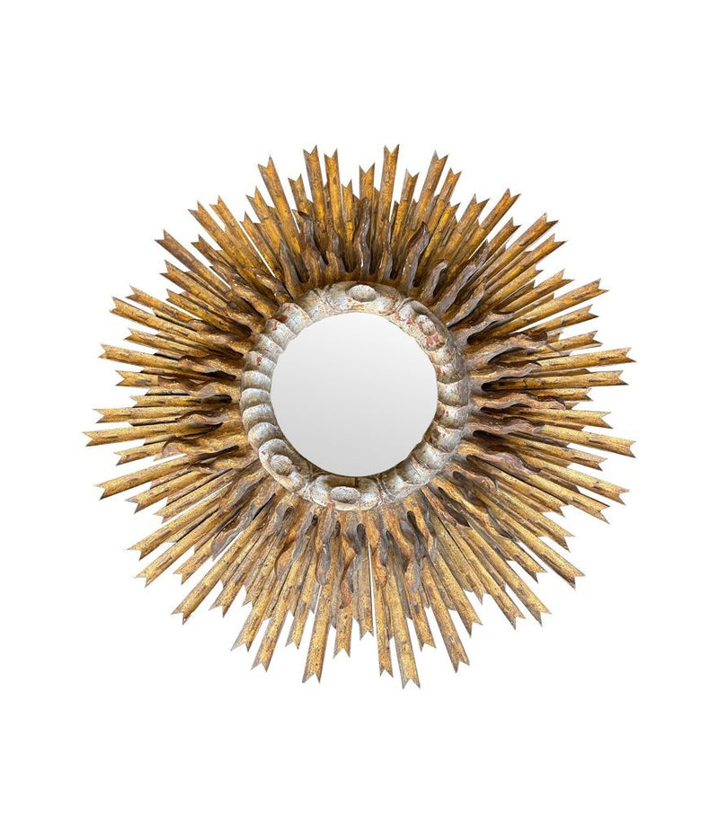 A large 1940s French carved wood gilt sunburst mirror