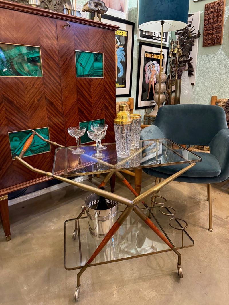 An Italian 1950s brass and lacquered wood bar trolley by Cesare Lacca