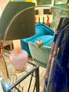 An Italian 1960s Crystal Arte oval mirror with pastel mint green mirrored frame