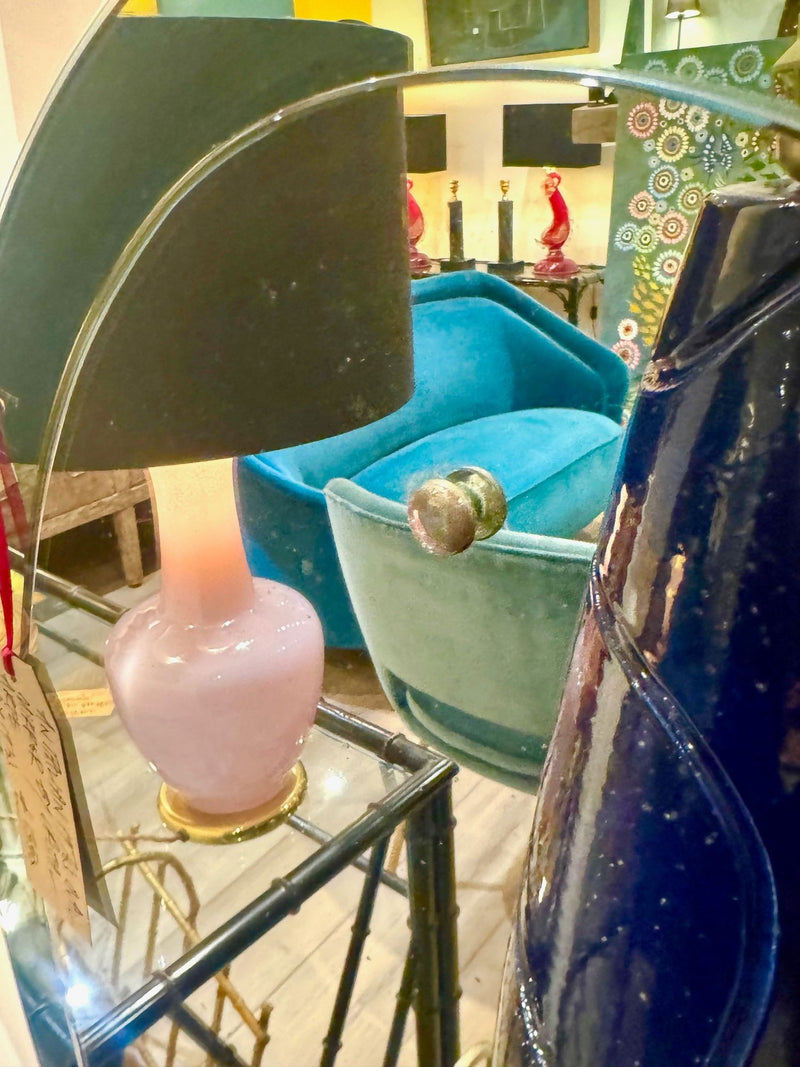 An Italian 1960s Crystal Arte oval mirror with pastel mint green mirrored frame