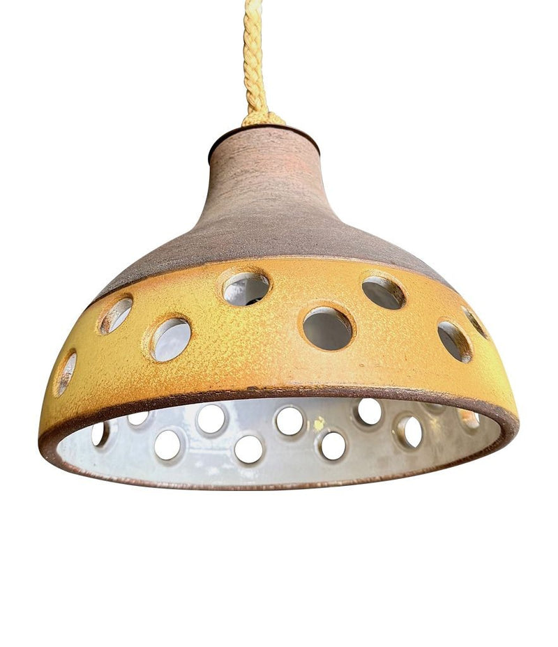 A set of three 1960s French glazed ceramic ceiling lights suspended from thick knotted rope