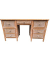 A 1980s colonial style carved wood and rattan desk by Roche Bobois
