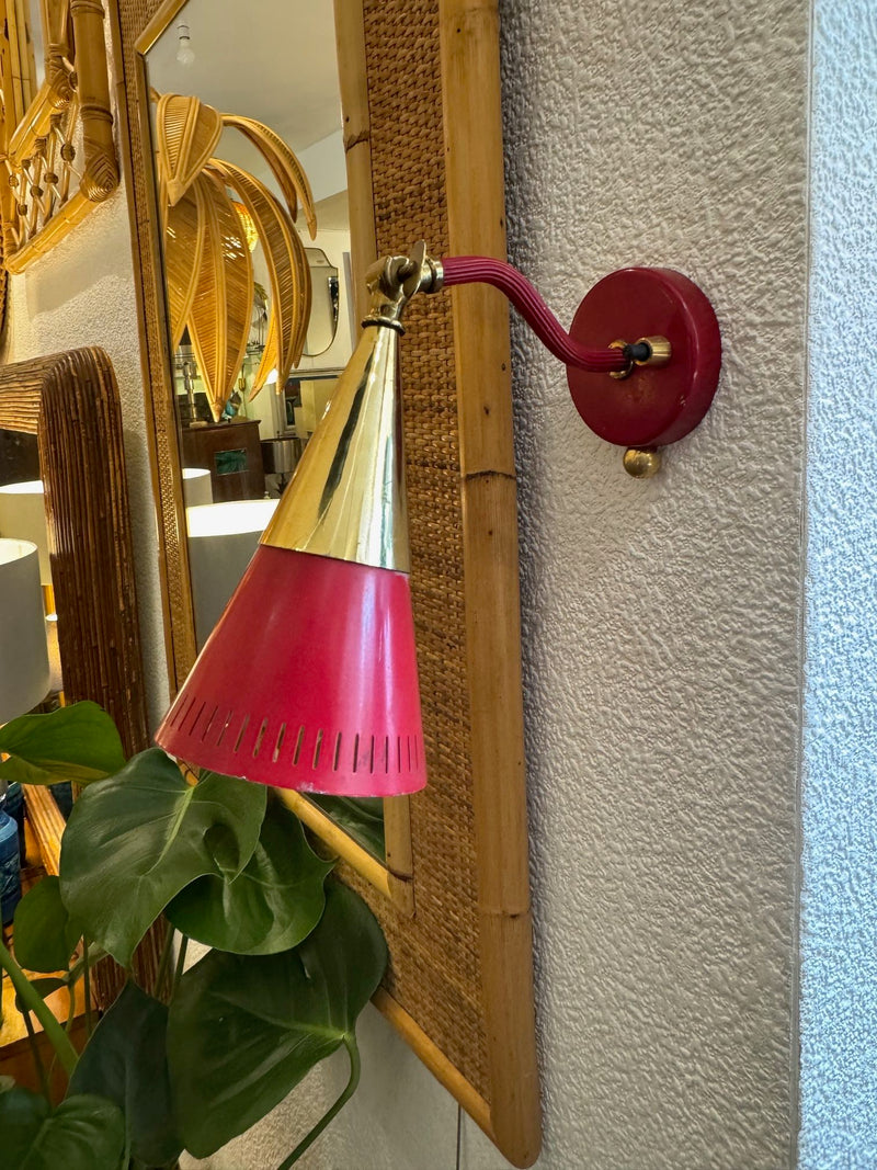 A pair of Holm Sorensen 1950s red enamelled metal and brass adjustable wall lights