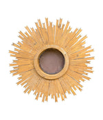 A large 1940s French carved wood gilt sunburst mirror