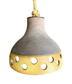A set of three 1960s French glazed ceramic ceiling lights suspended from thick knotted rope