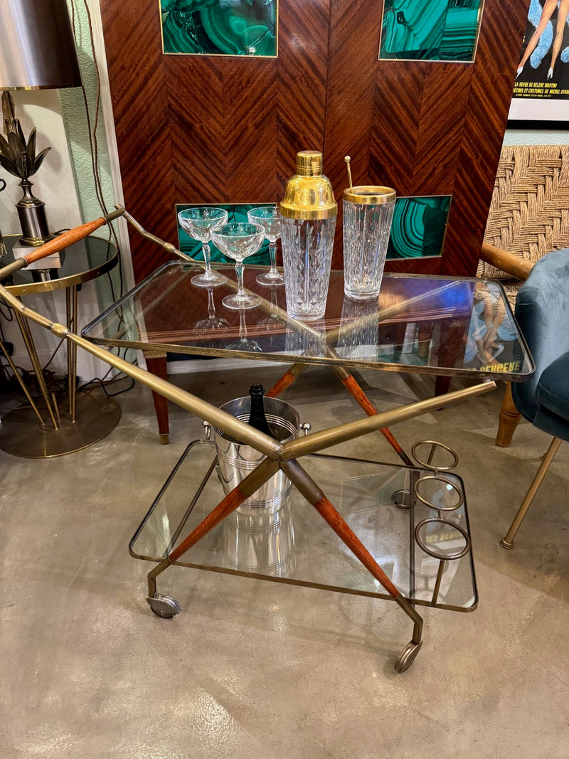 An Italian 1950s brass and lacquered wood bar trolley by Cesare Lacca