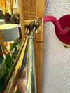 A pair of Holm Sorensen 1950s red enamelled metal and brass adjustable wall lights