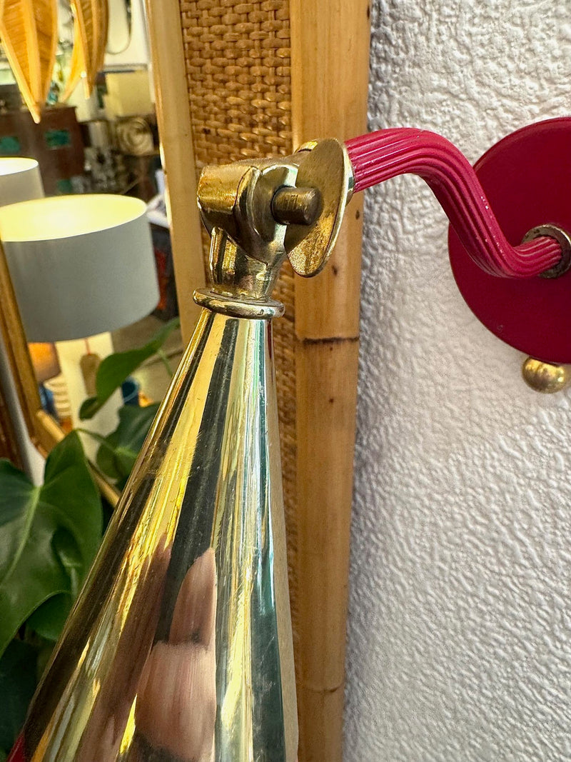 A pair of Holm Sorensen 1950s red enamelled metal and brass adjustable wall lights