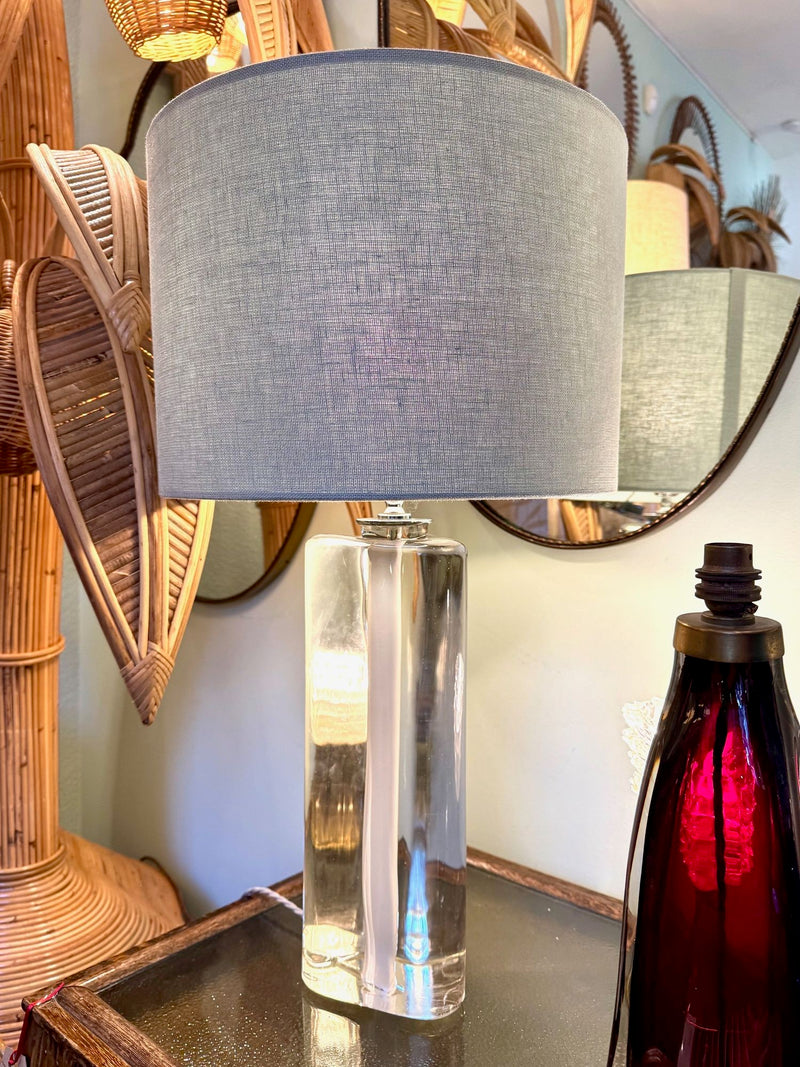 A pair of 1960s Orrefors heavy glass lamps with white glass core and nickel fittings