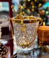 A 1960s Val Saint Lambert crystal and gold plated ice bucket with ice grabbers