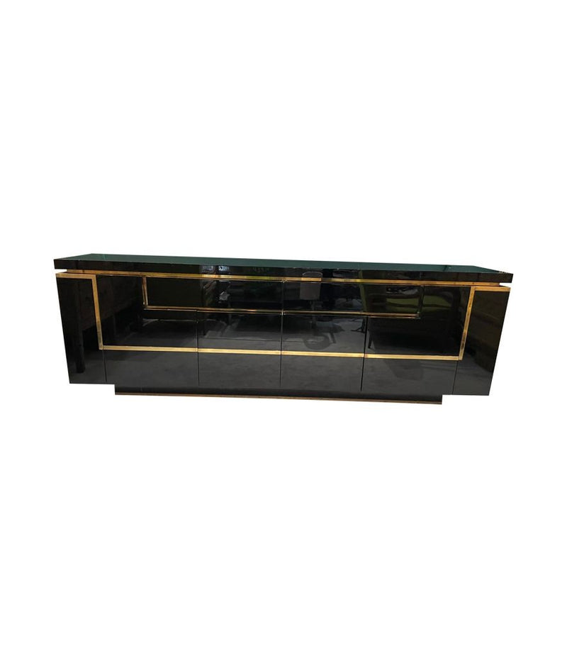 A 1970s vintage black piano lacquer sideboard by Jean Claude Mahey for Roche Bobois with brass detail