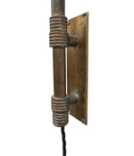 An Italian 1950s Stilnovo brass extendable telescopic wall light with green stitched leather arm