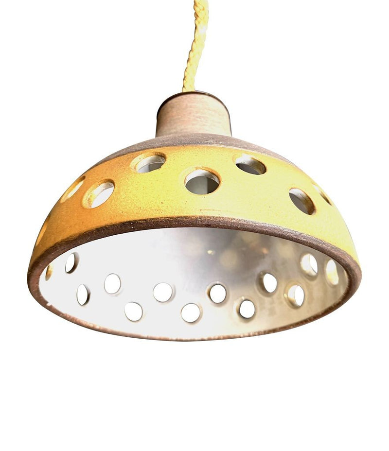 A set of three 1960s French glazed ceramic ceiling lights suspended from thick knotted rope