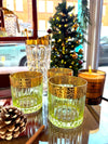 A set of six Italian Artemisia green crystal tumblers with 24 ct gold decoration
